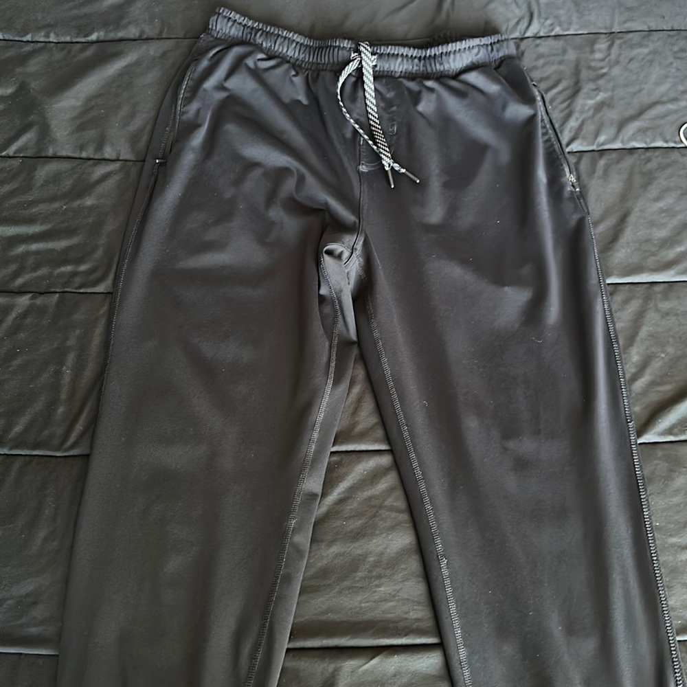 Large black Kirkland joggers.